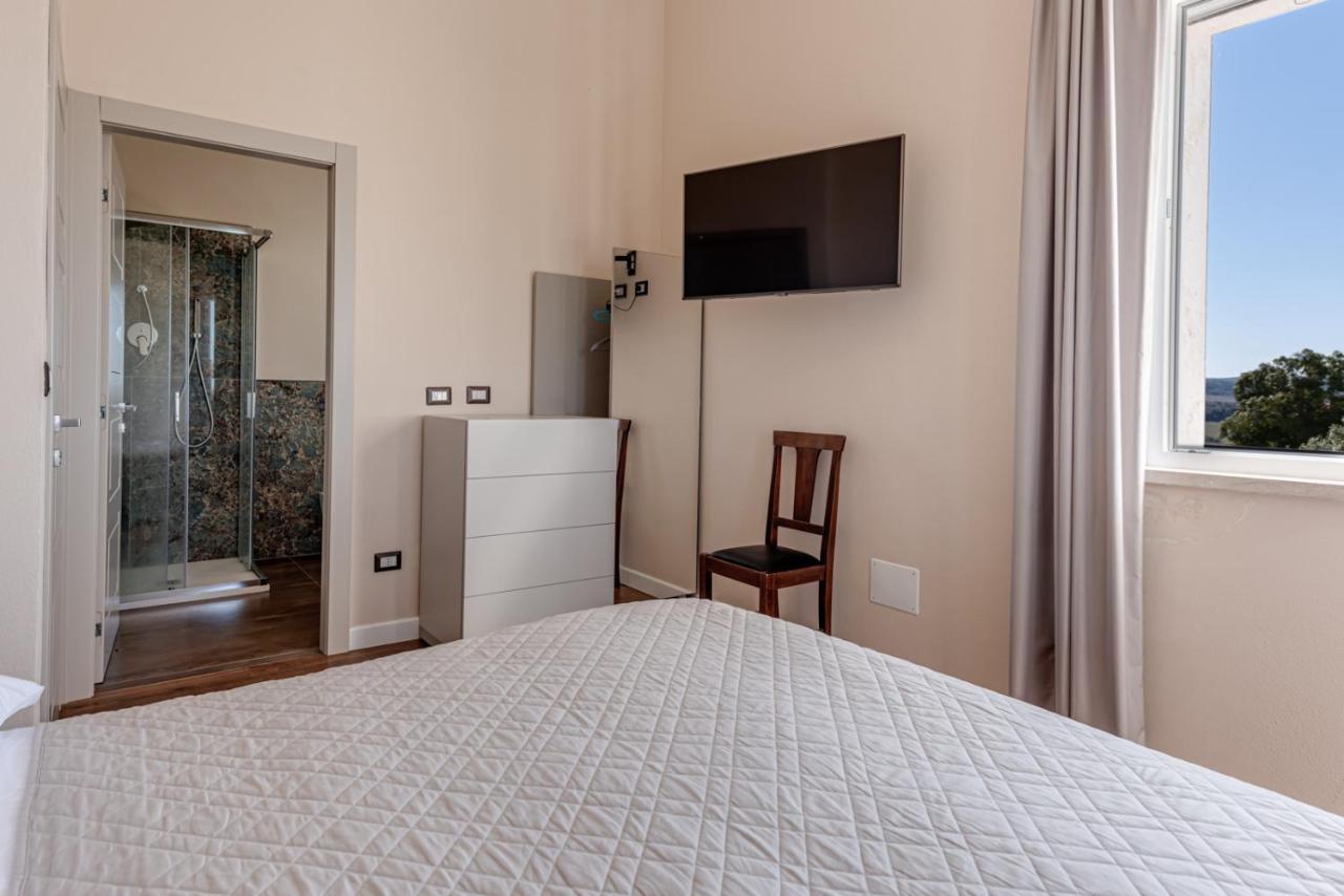 Relais Le Ginestre Villa Saturnia Bagian luar foto